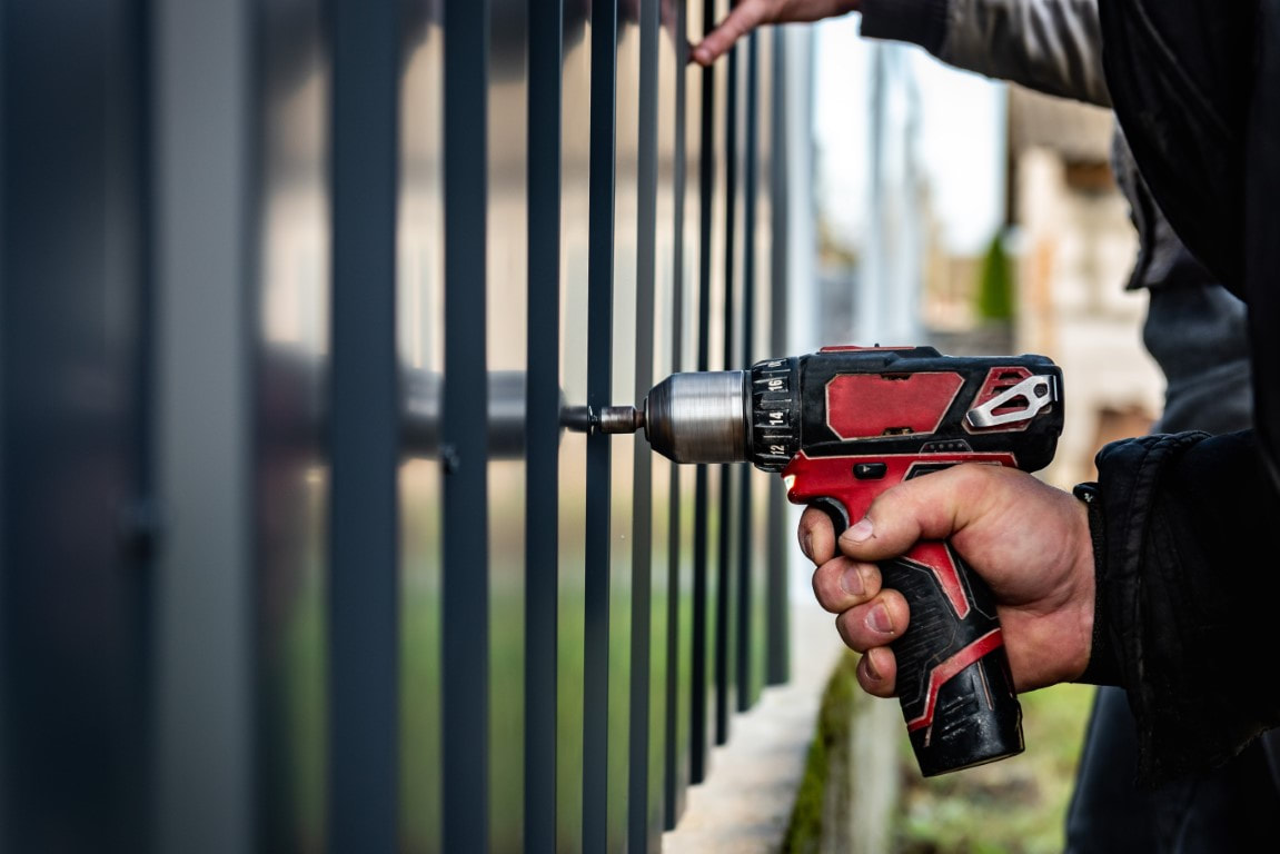 An image of a person working on Fencing Services in Wellington, FL
